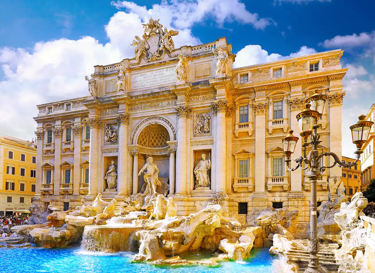 The Trevi Fountain in Rome with its baroque sculptures and turquoise water.